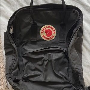 Black Fjallraven Backpack with Red Logo